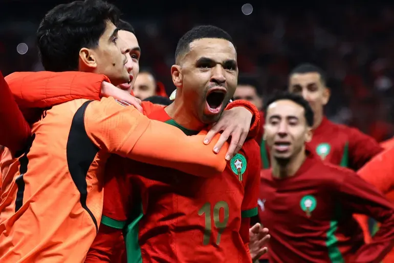 Morocco national team celebrating qualification for the AFCON final